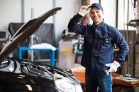 mechanic-working-car-engine_53419-4005.jpg